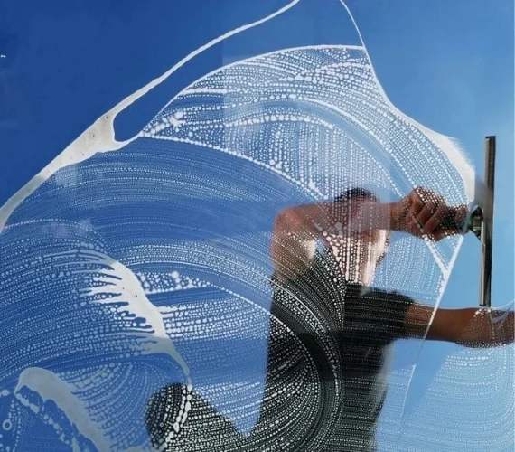 Spotless glass balustrades and exterior windows at a luxury marina restaurant in Gibraltar, maintained by local commercial window cleaning specialists.